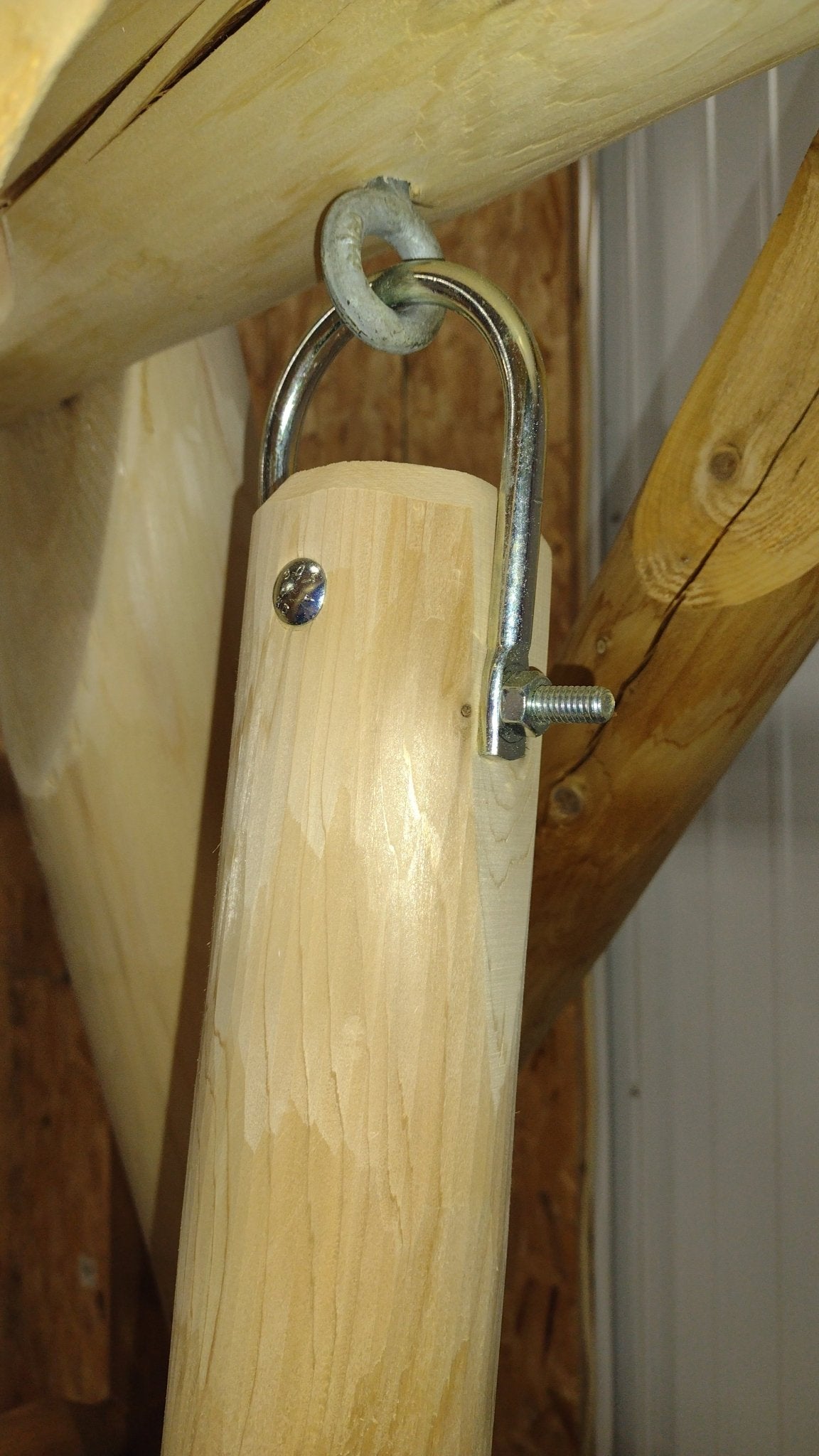 Heavy-duty hanging mechanism for log outdoor chairs, ensuring secure and smooth movement.